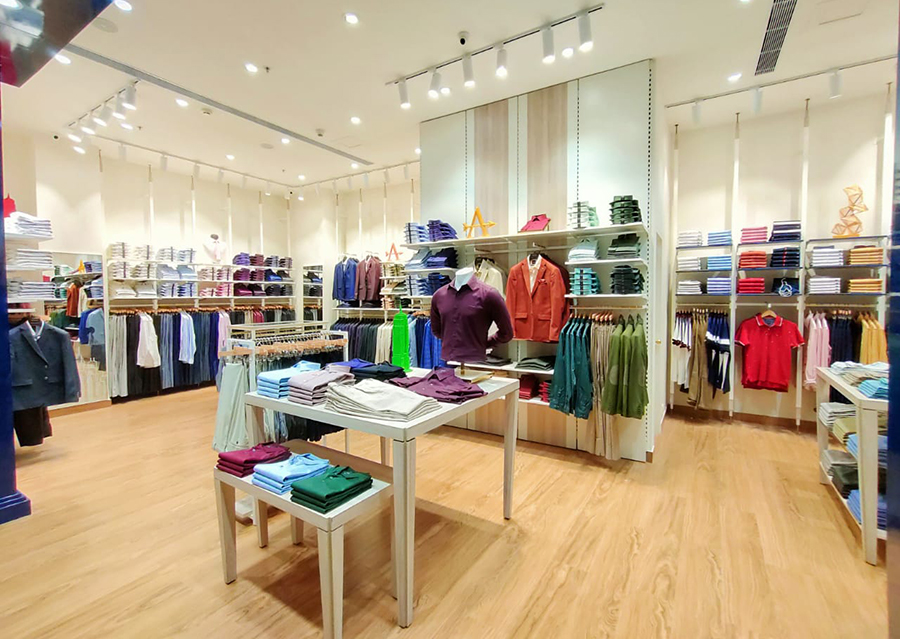 Arrow store inside, cloths displayed on fixtures with attractive lighting, Banglore