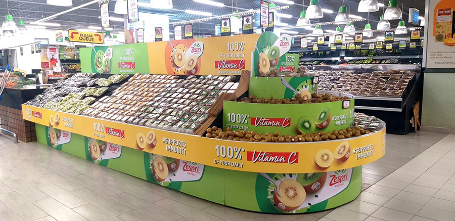 Zespri brand with Kiwi fruit display in retail store space