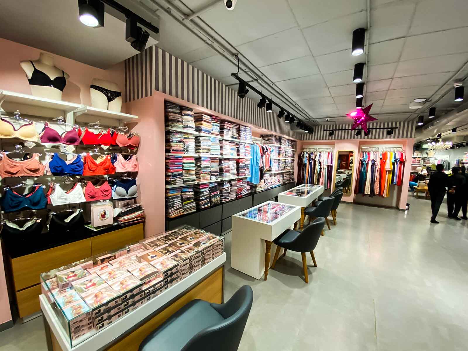 Inside store view, cloths on shelves
