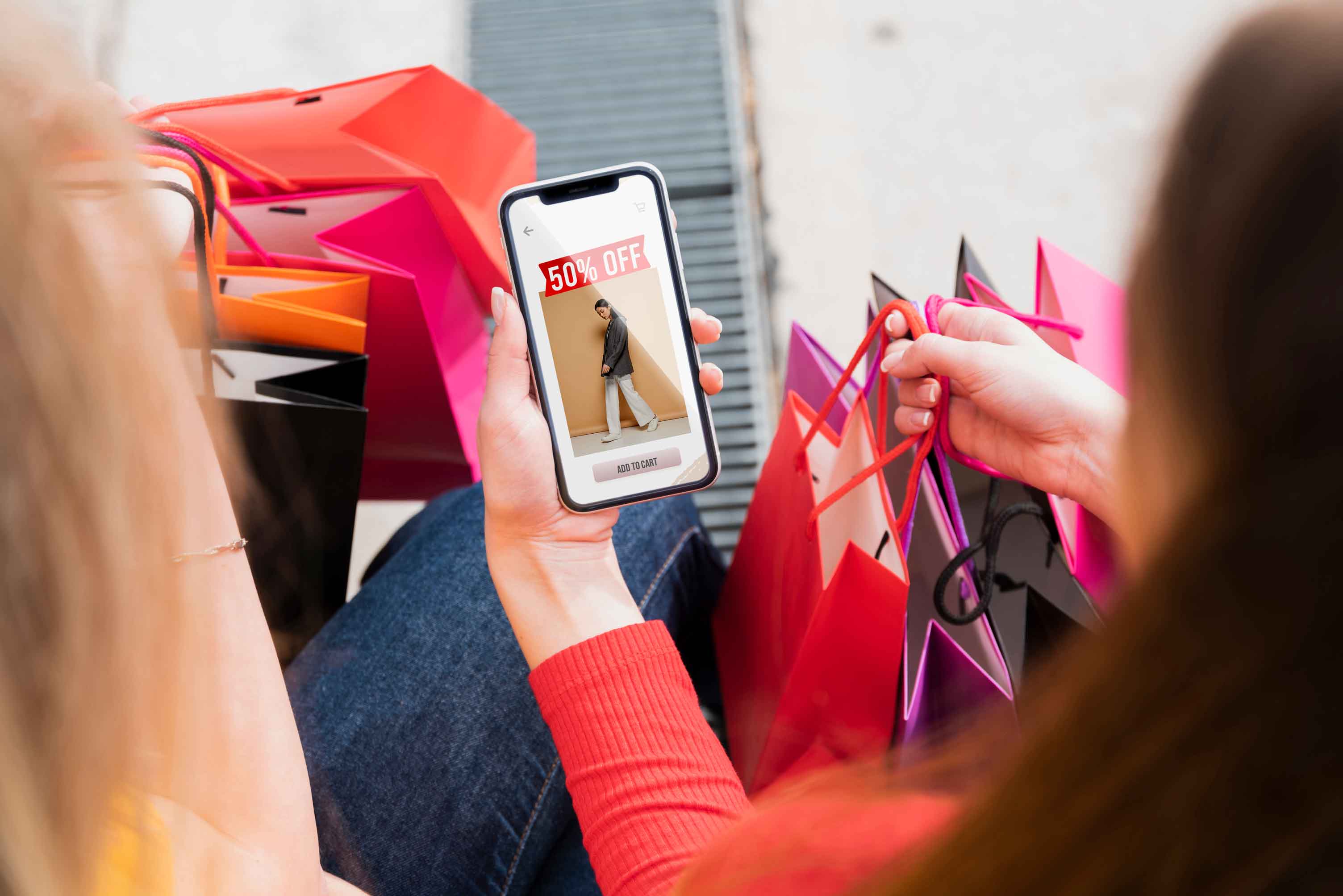 high-angle-woman-holding-smartphone