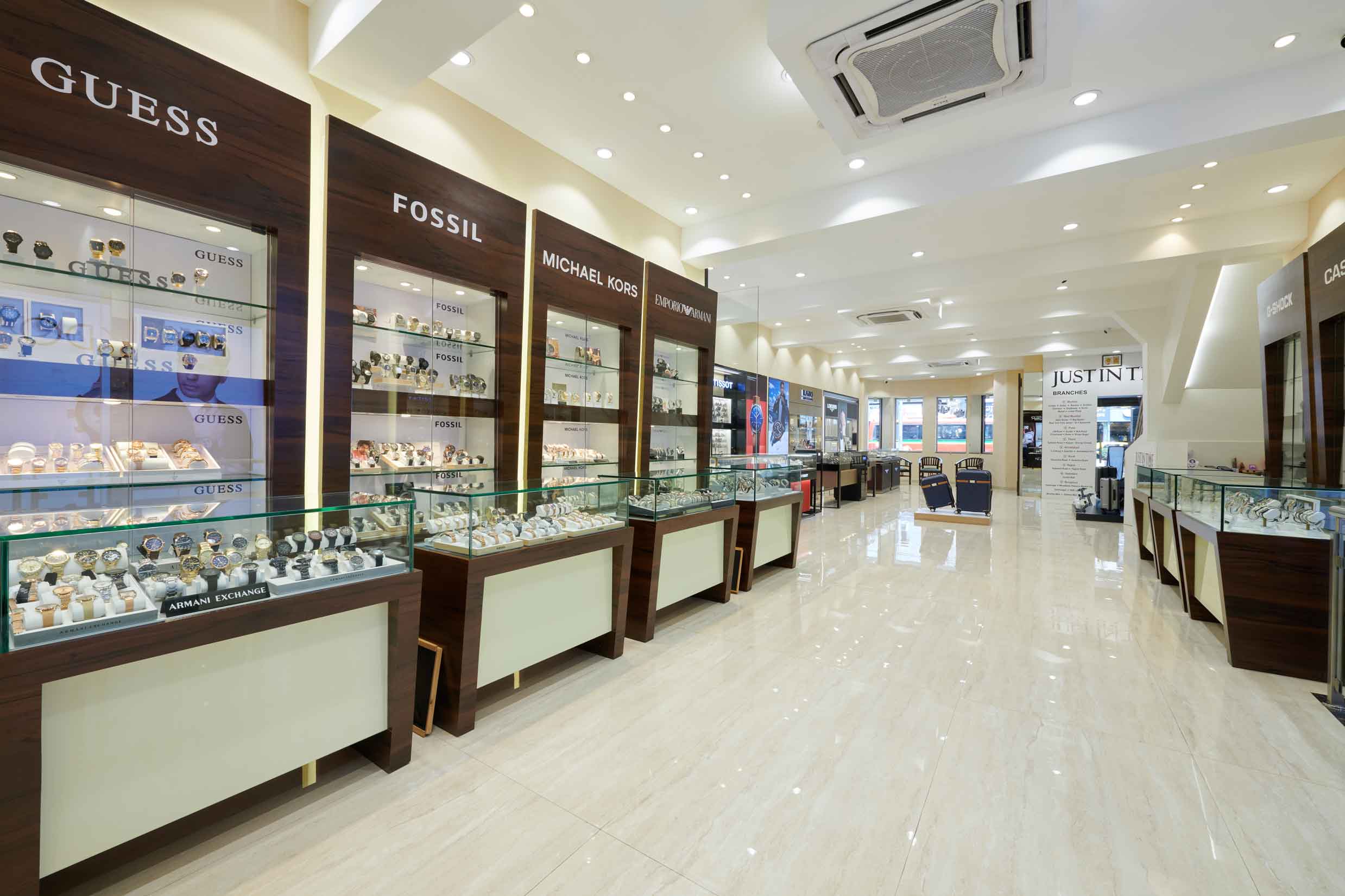 Premium brands like Guess, FOSSIL, Michael kors on display  