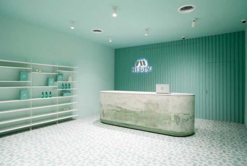 Pharmacy delivery app Medly has opened a waiting room to pick up subscriptions in Brooklyn, New York. The small waiting room uses a subtle blend of material textures and turquoise tones to create a calming space with a premium yet technical feel. Pic credit: Medly Pharmacy by Sergio Mannino Studio