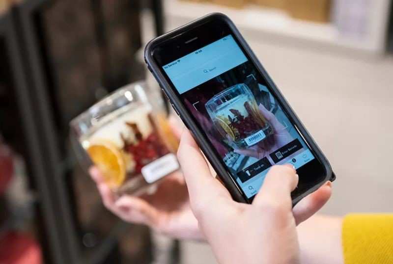 UK department store John Lewis enables customers to compile wish lists in-store by scanning displayed products through their brand app. Customers can then review and edit these lists away from the store before transacting.