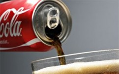 Coca-Cola bets big on small bottles, cans