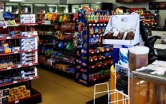 Store closings, food stamp cuts hit Wal-Mart outlook