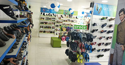 red tape sports shoes showroom
