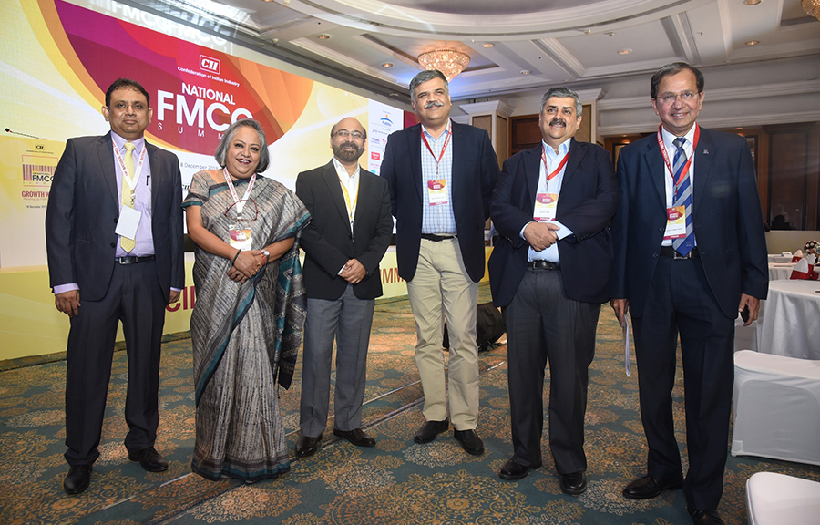 Ms. Indrani Kar, Principal Advisor, CII, Mr. Nikhil Prasad Ojha, Partner, Bain & Company, Mr. Bharat Puri; Chairman, CII National Committee on FMCG and Managing Director, Pidilite Industries & Mr. Suresh Narayanan; Chairman and Managing Director, Nestle India